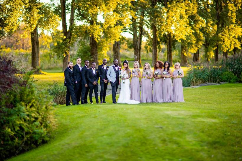 Bridal party on a lawn